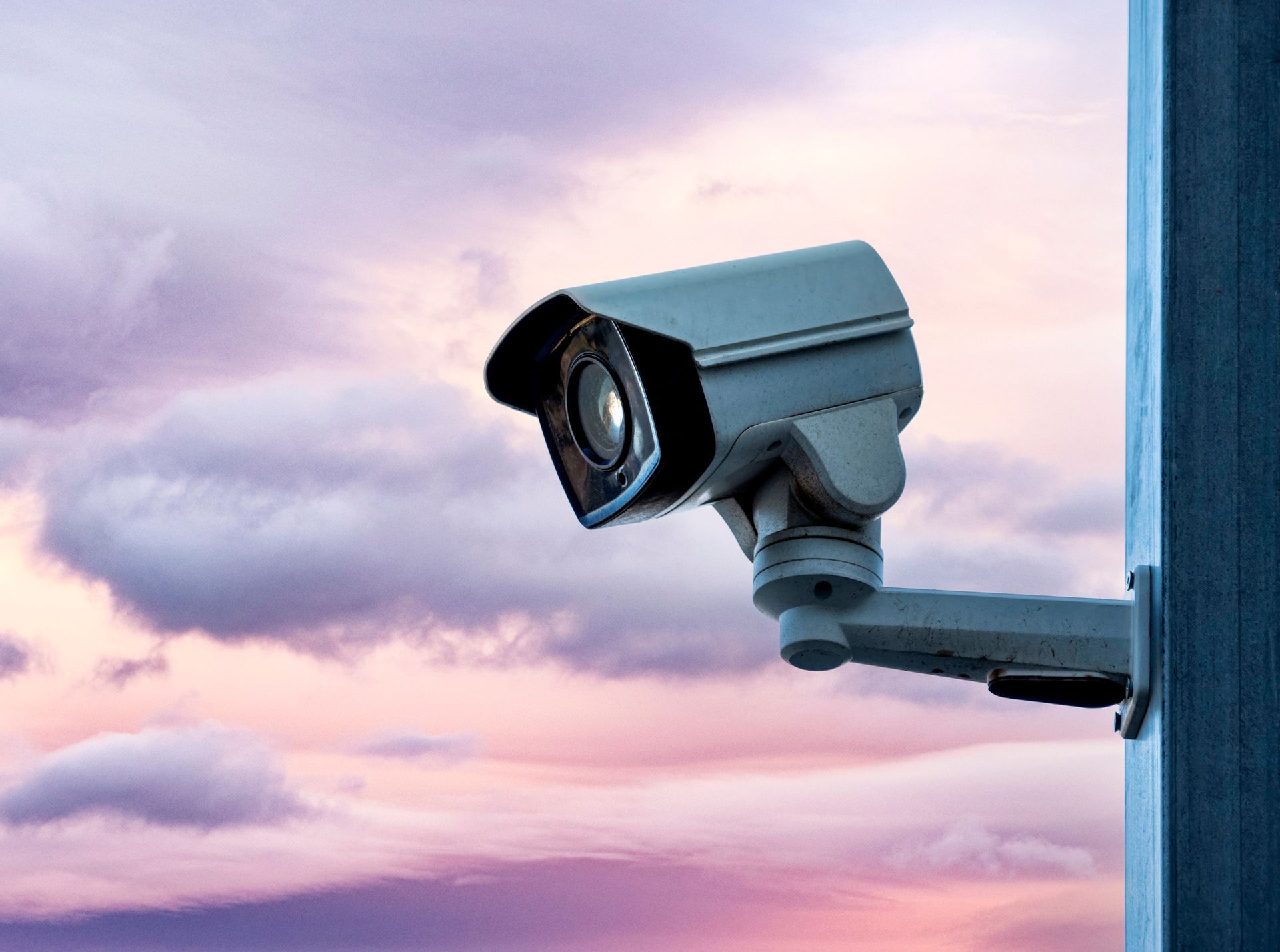 Security camera and traffic surveillance in the city at sunset. Security camera and traffic surveillance in the city at sunset.