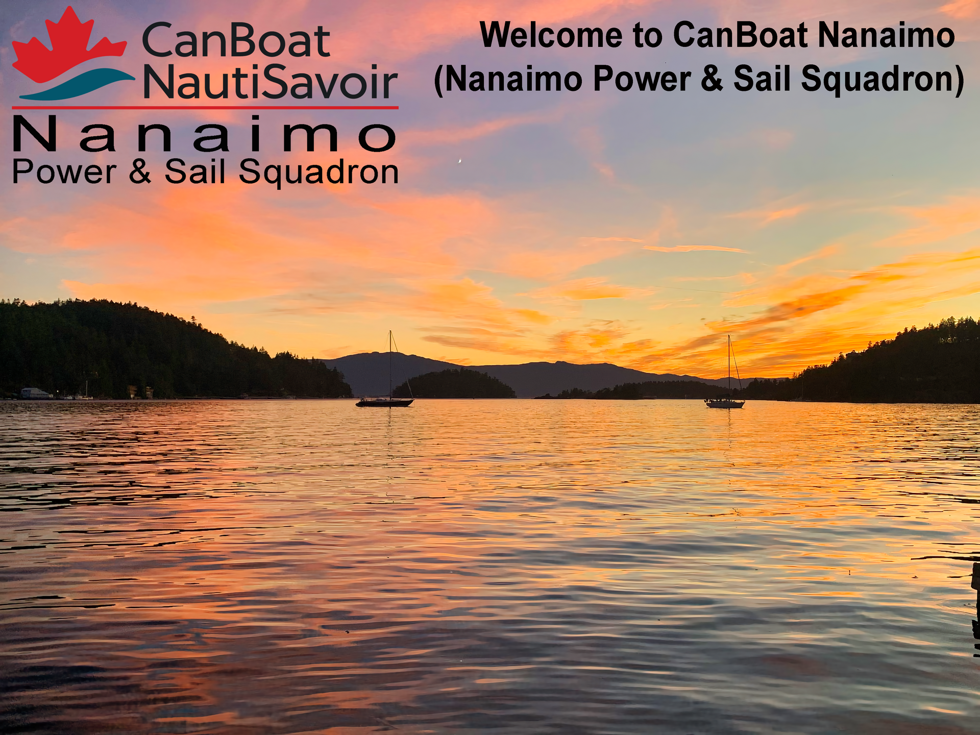 Sunset over Nanaimo harbor, boats on water, logo for CanBoat Nanaimo Power & Sail Squadron.
