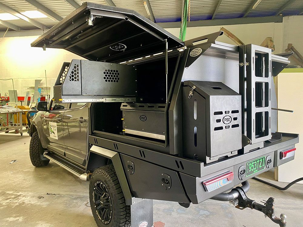 A Black Ram Truck with A Rack on Top of It — PSE Stainless Steel Fabrications in Manunda, QLD