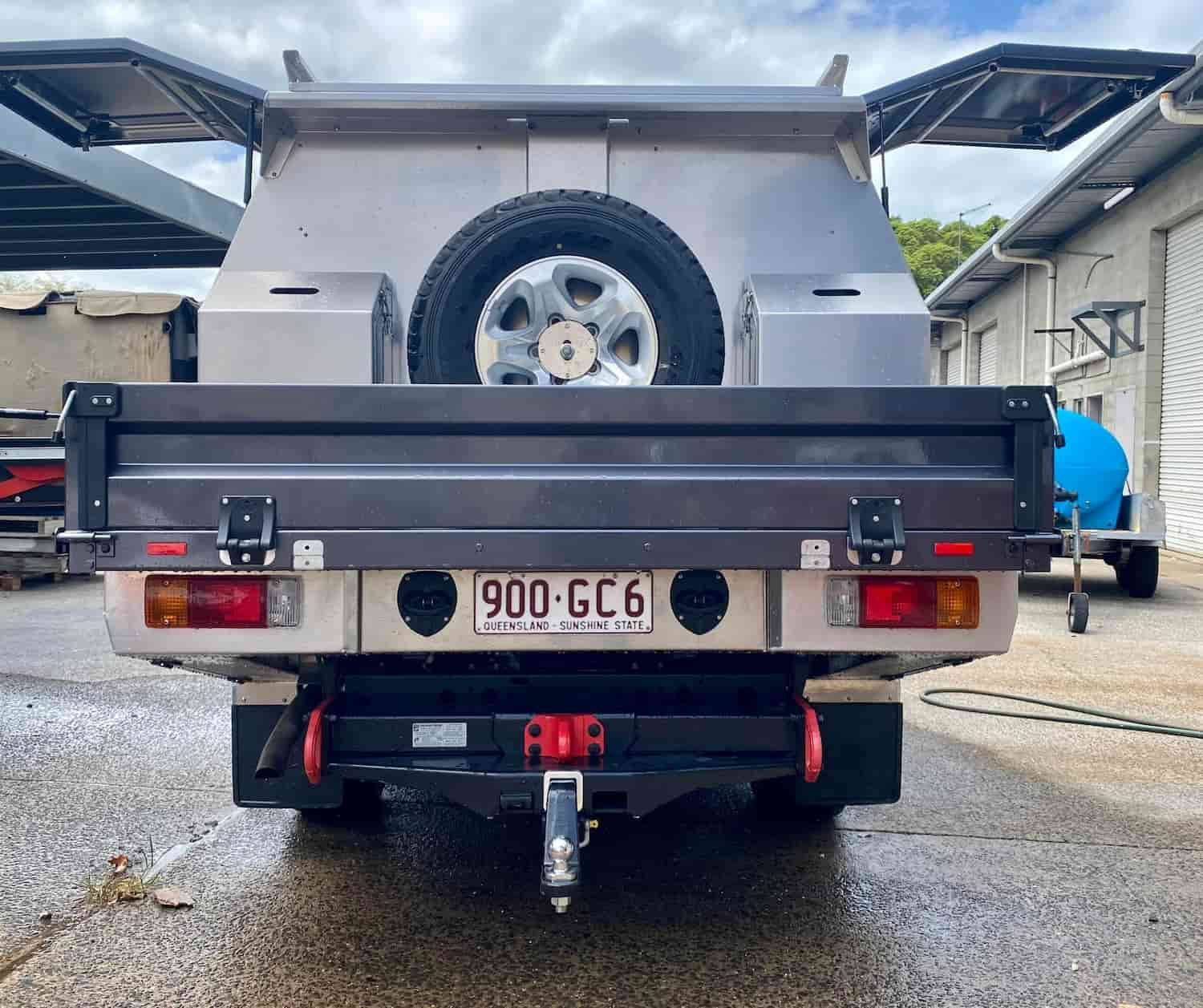 The Back of a Truck With a License Plate That Says 900-gc6 — PSE Stainless Steel Fabrications In Manunda, QLD