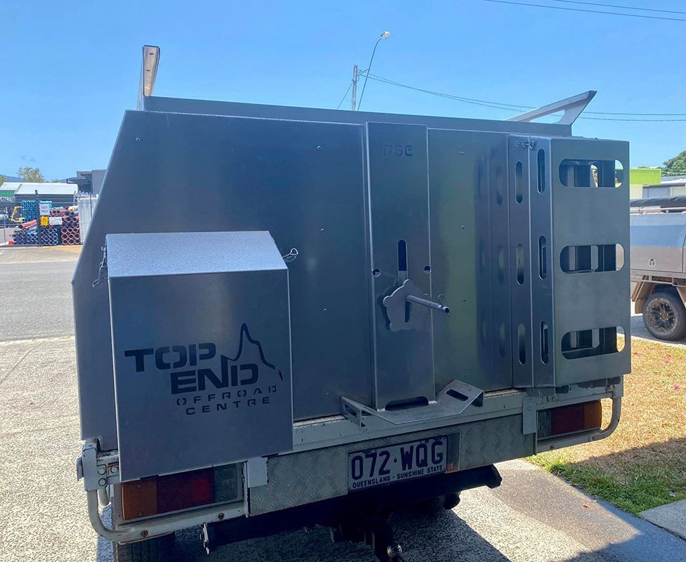 A Stainless Steel Trailer Is Parked in A Parking Lot — PSE Stainless Steel Fabrications in Manunda, QLD