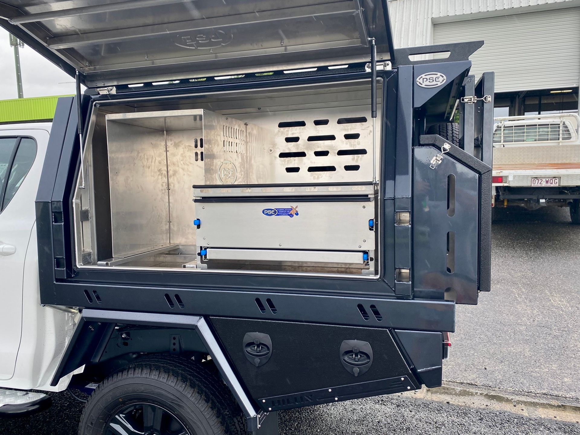 A Trailer with A Ladder Attached to The Back of It — PSE Stainless Steel Fabrications in Manunda, QLD