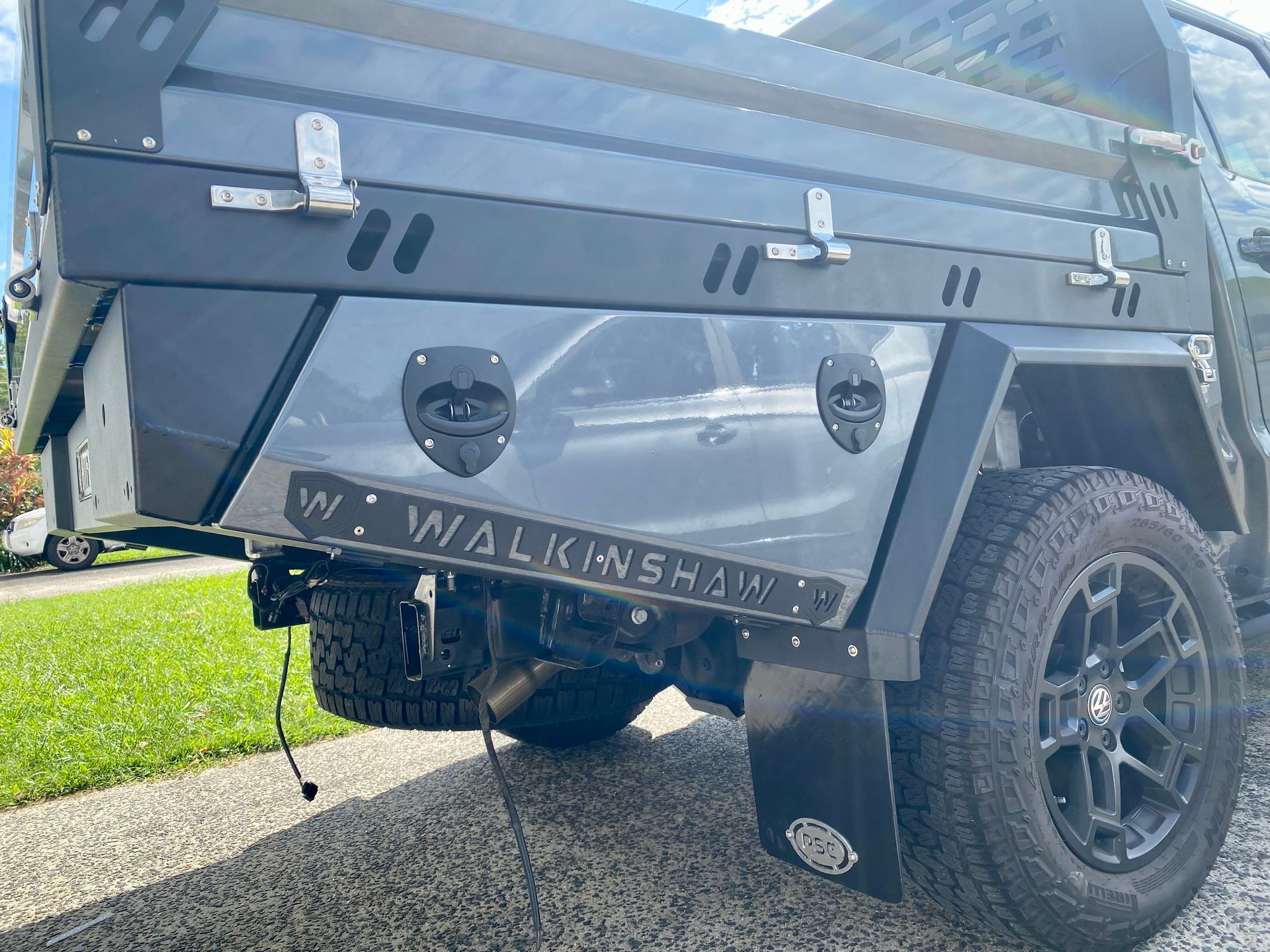 A black truck is parked on the side of the road  — PSE Stainless Steel Fabrications in Manunda, QLD