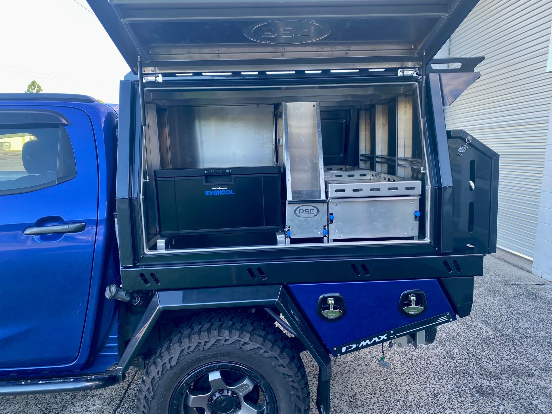 A blue truck with a canopy on top of it  — PSE Stainless Steel Fabrications in Manunda, QLD