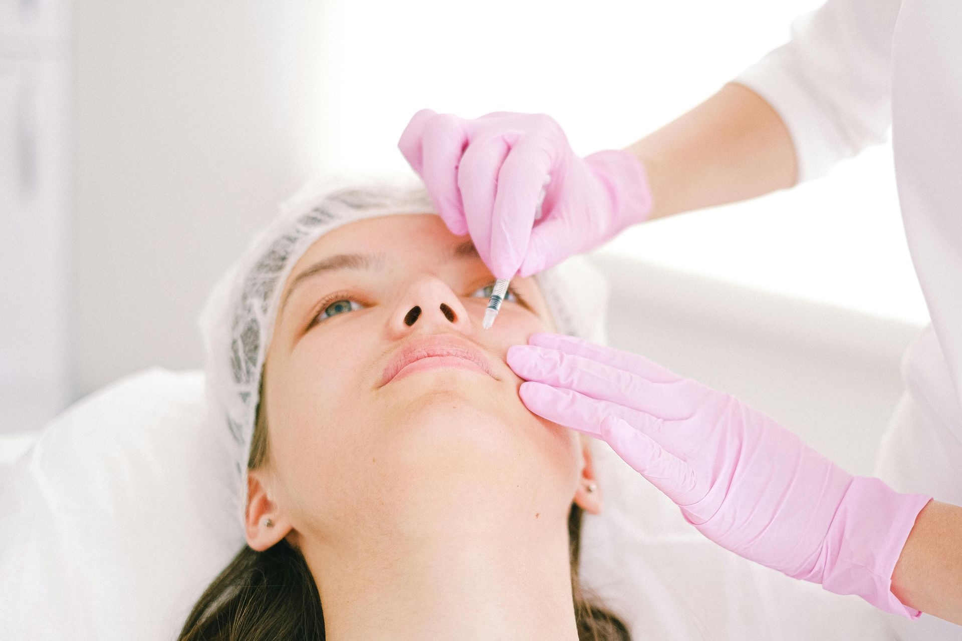 woman getting lip injections
