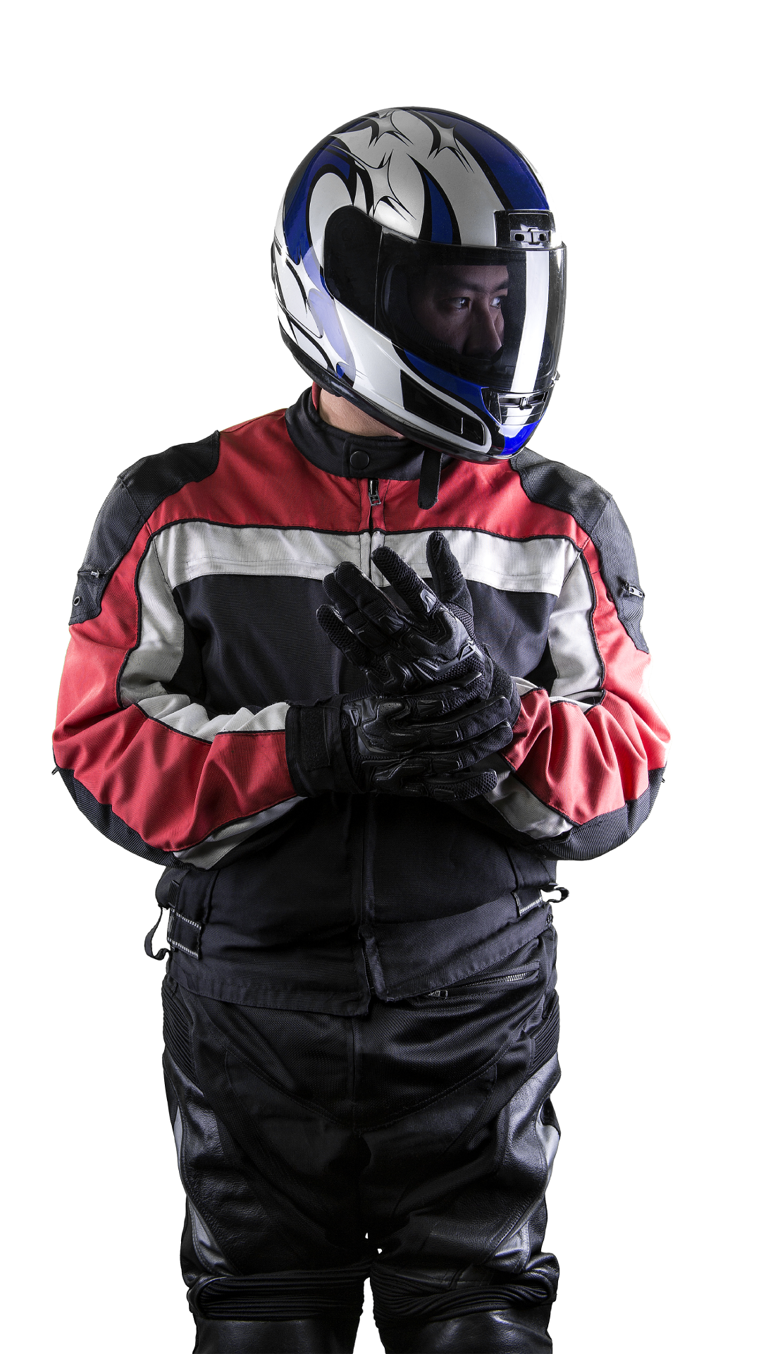 Person in motorcycle gear: helmet, jacket, gloves, black leather pants.