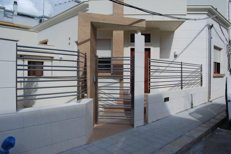 lavorazioni in acciaio, recinzione, inferriata, portoncino pedonale