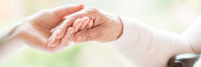 close tender gesture between two generations