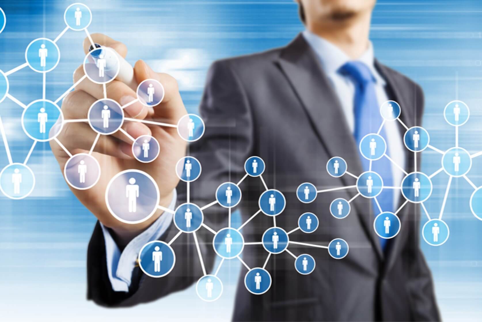 man in suit connecting a web of people together