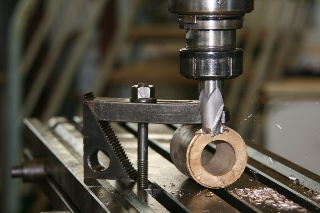Customising Machine Part With Drill Press — Steel Fabrication in Winnellie, NT