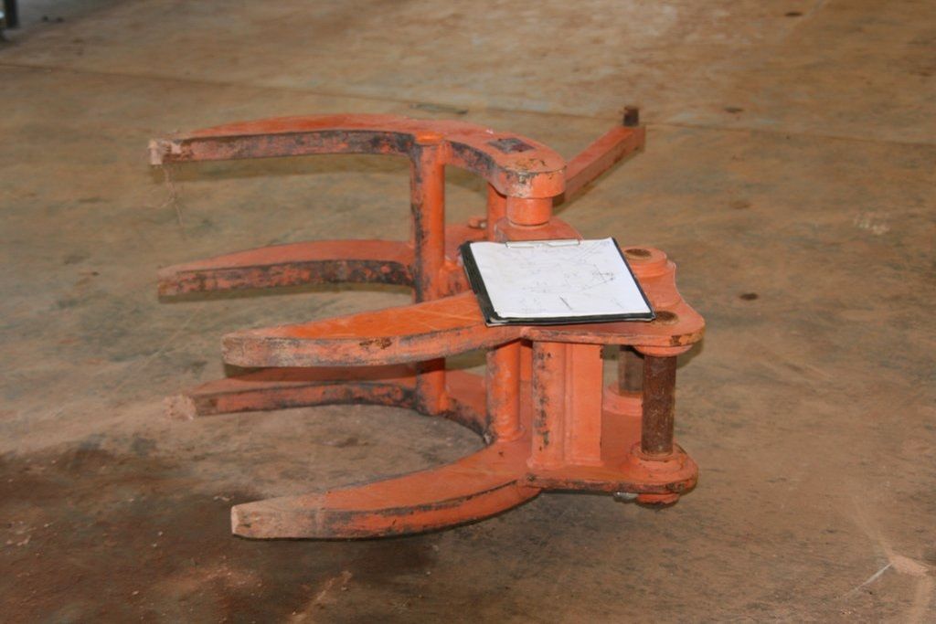 A Piece of Wood is Sitting on the Floor Next to a Piece of Paper — Preston’s NT in Winnellie, NT