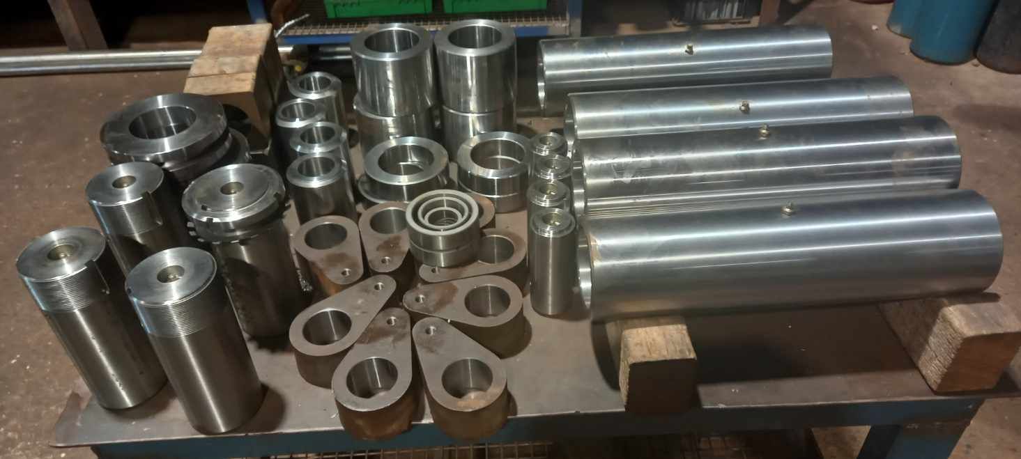 A Bunch of Metal Cylinders Are Sitting on a Table — Preston’s NT in Winnellie, NT