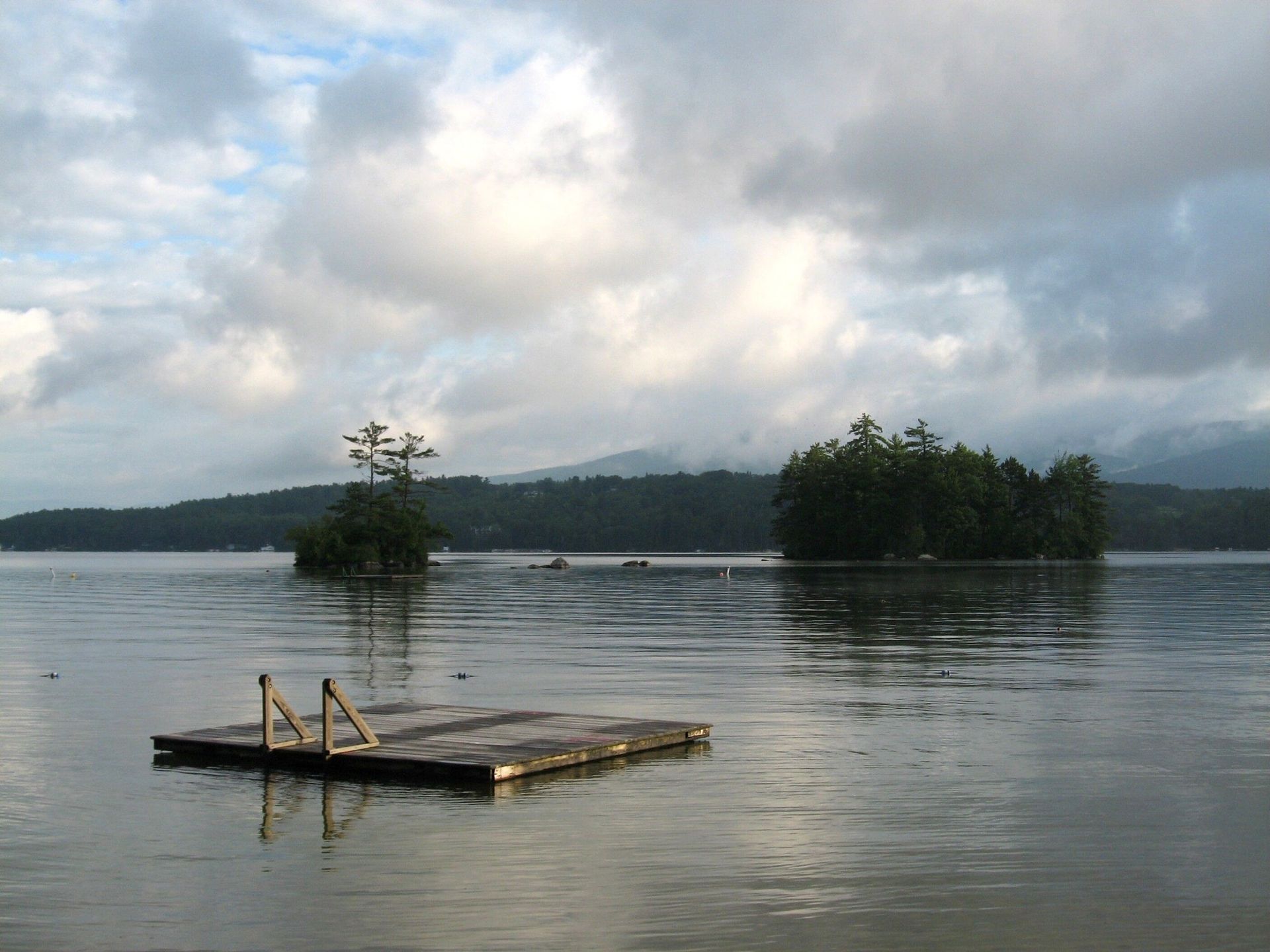 A small island in the middle of a lake