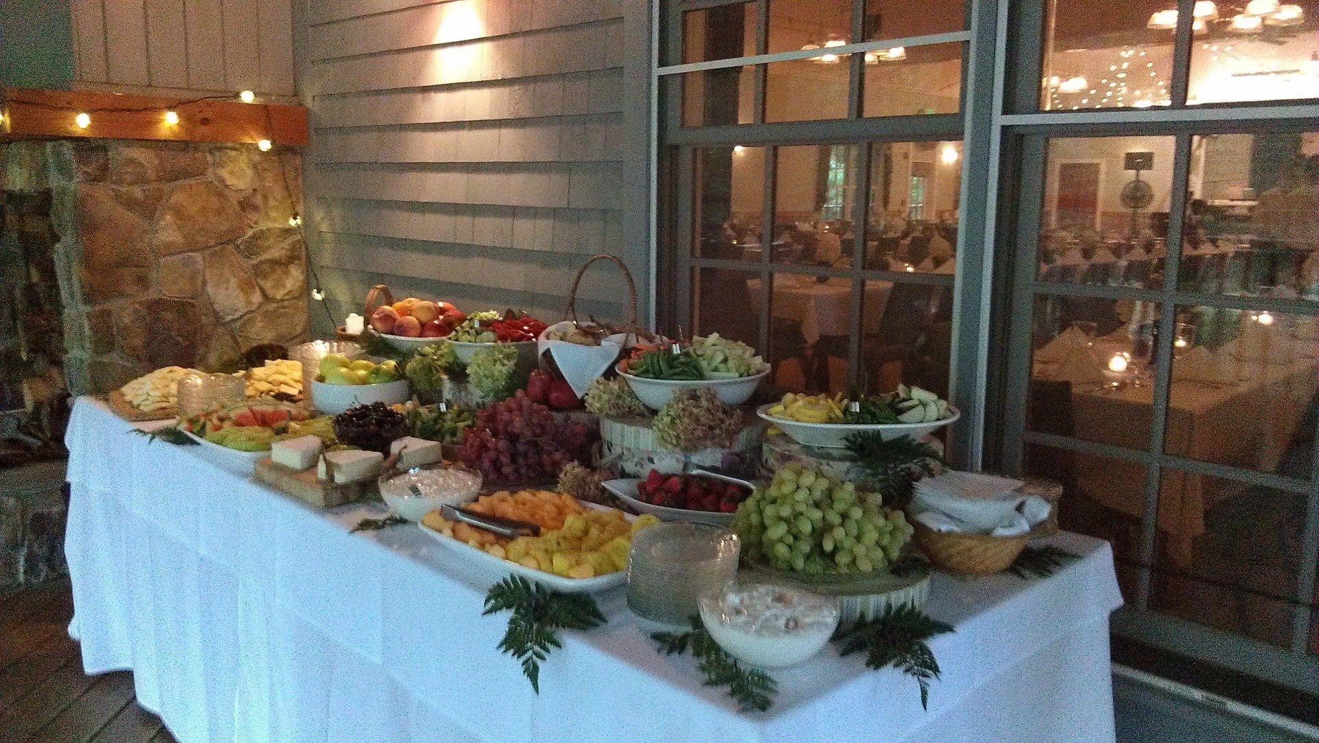 There is a buffet table with a lot of food on it.