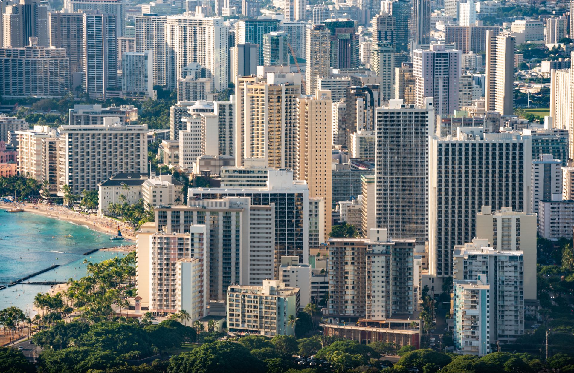 A person is writing on a piece of paper with a pen.