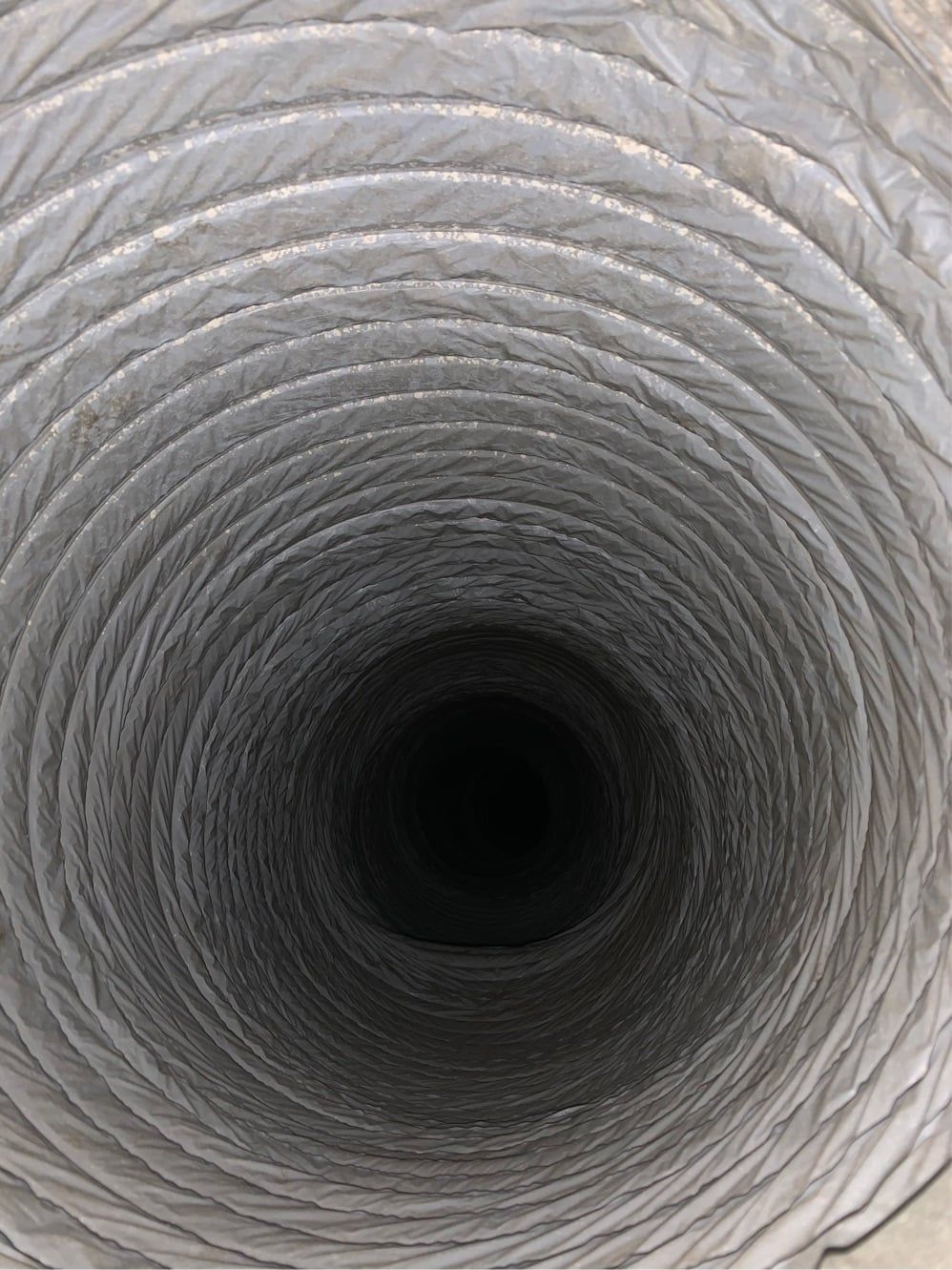 A close up of the inside of a spiral duct.