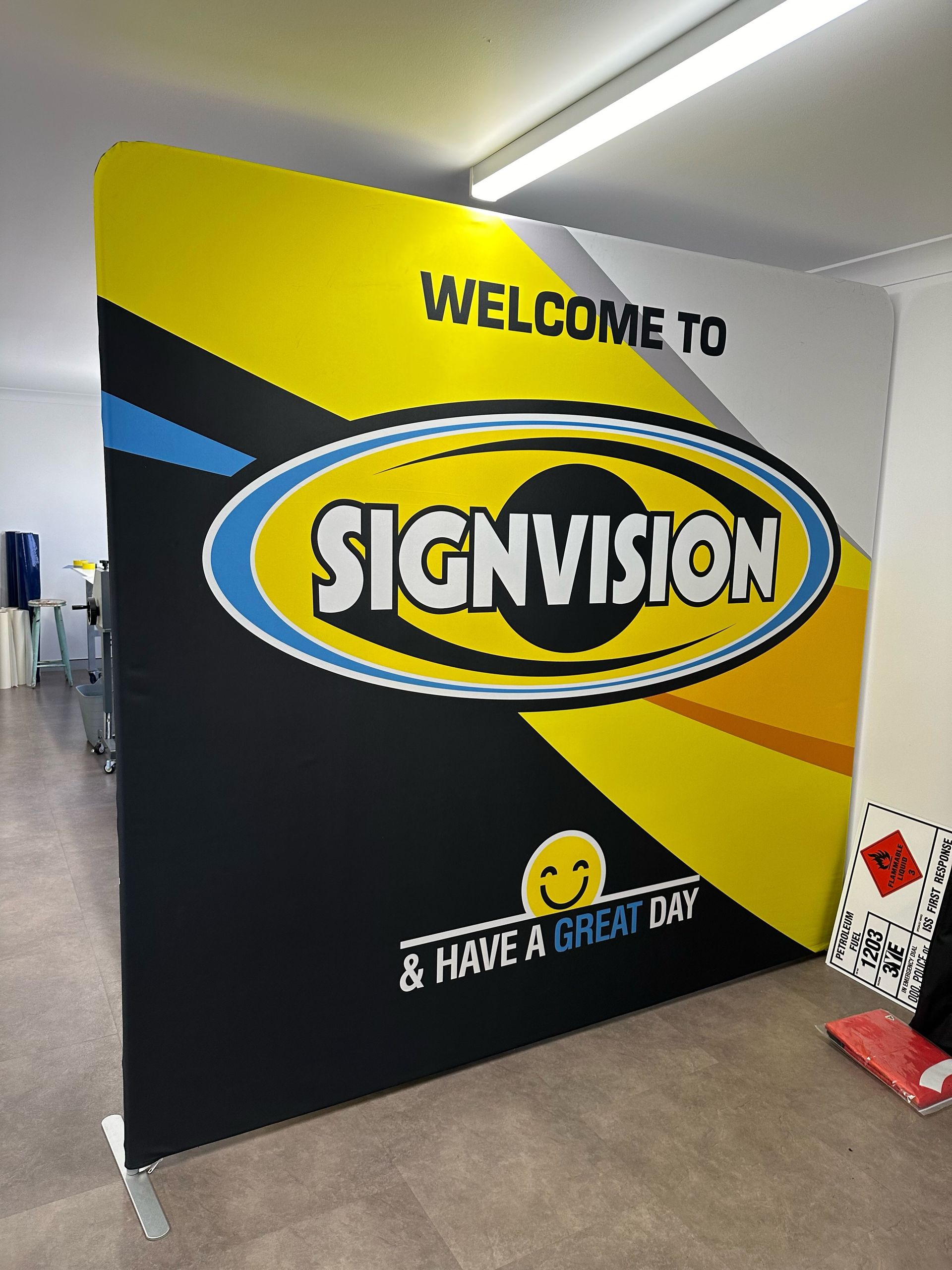 A large fabric display banner reading 