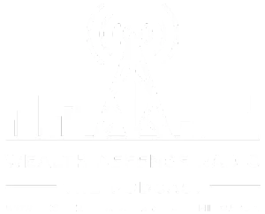 A digital illustration of a stylized, friendly-looking blue monster with yellow horns and spots.