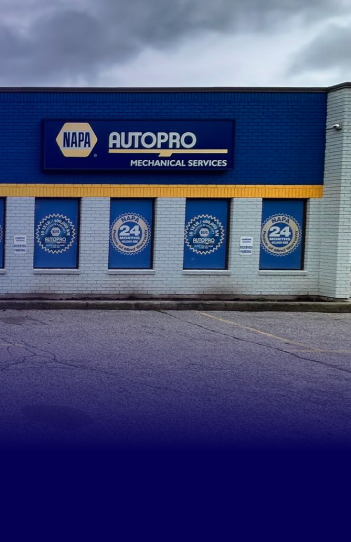 NAPA AutoPro building with a blue facade and a sign advertising mechanical services | AUTOPRO Oakville