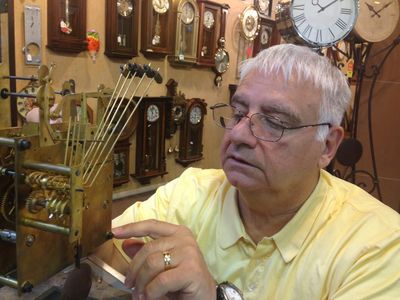 Man Fixing Clock —  Clock Restoration in White Plains, NY
