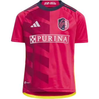 A pink shirt that says purina on the front