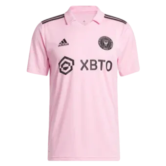 It is a pink soccer jersey with a black logo on it.