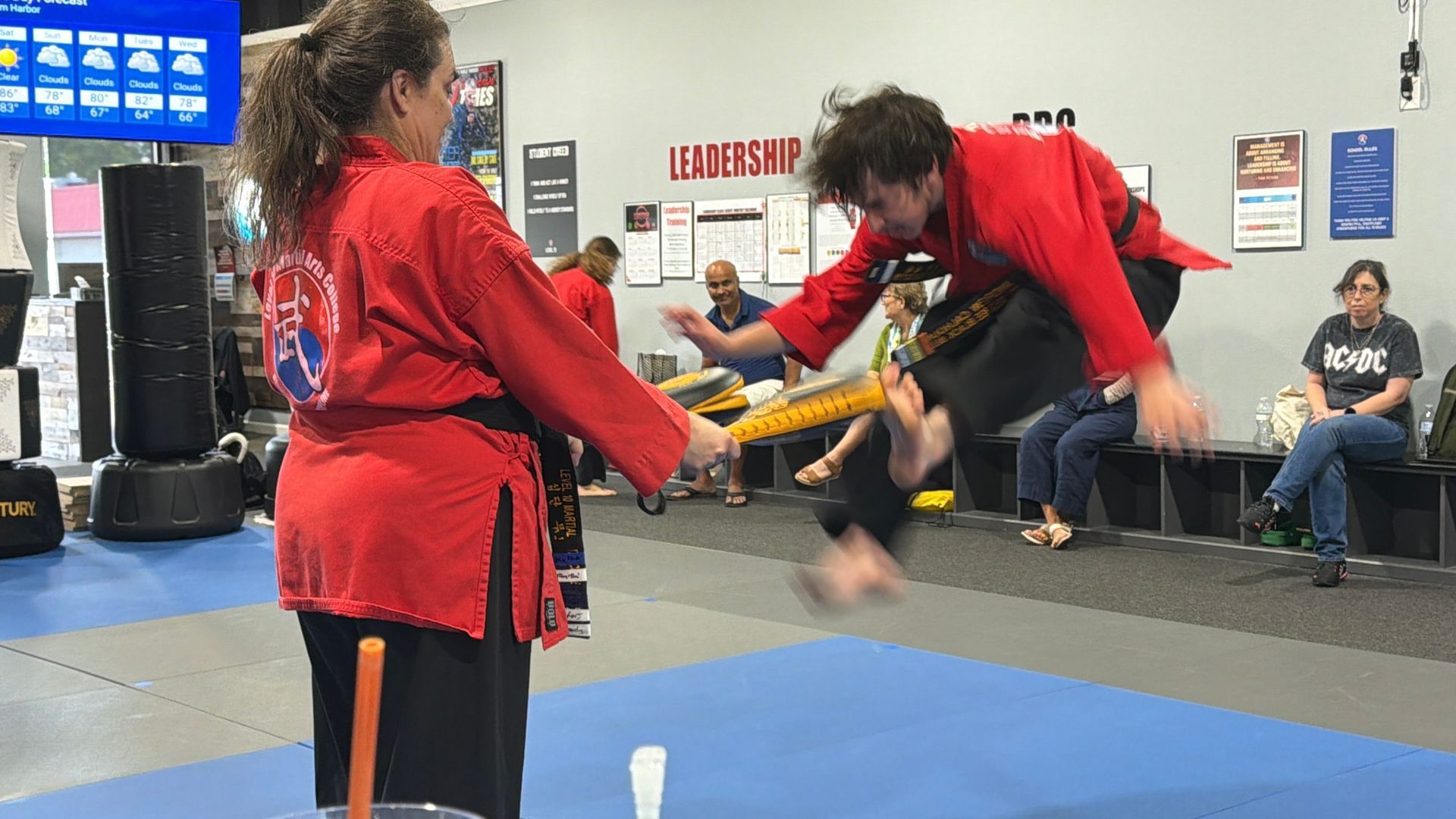 Teenage boy does double jump front kick at Level 10 in Palm Harbor