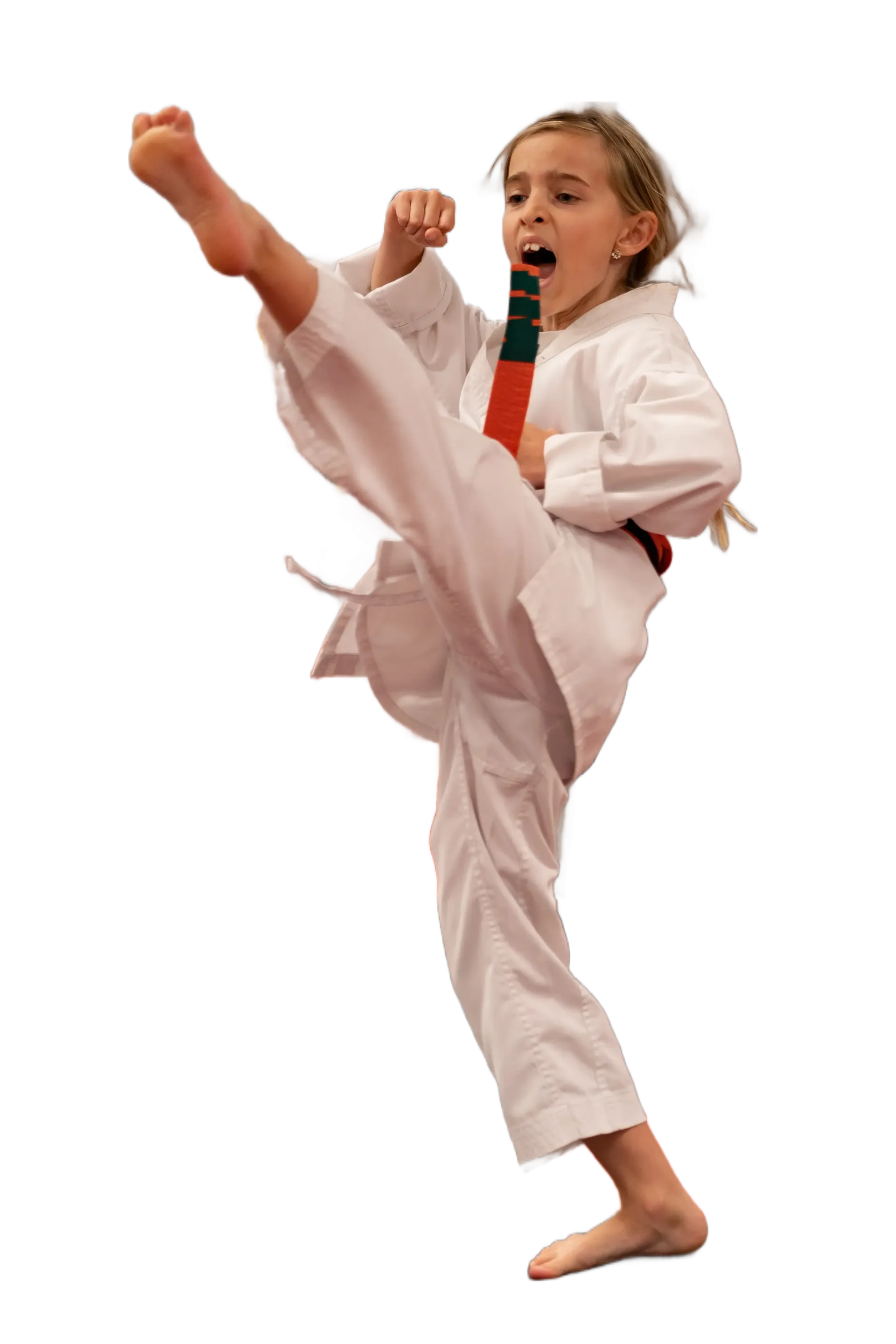 Child in a white martial arts uniform performing a high kick against a white background