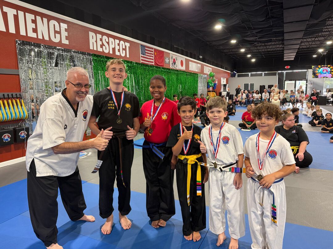 Master Theros and students at graduation in Palm Harbor.