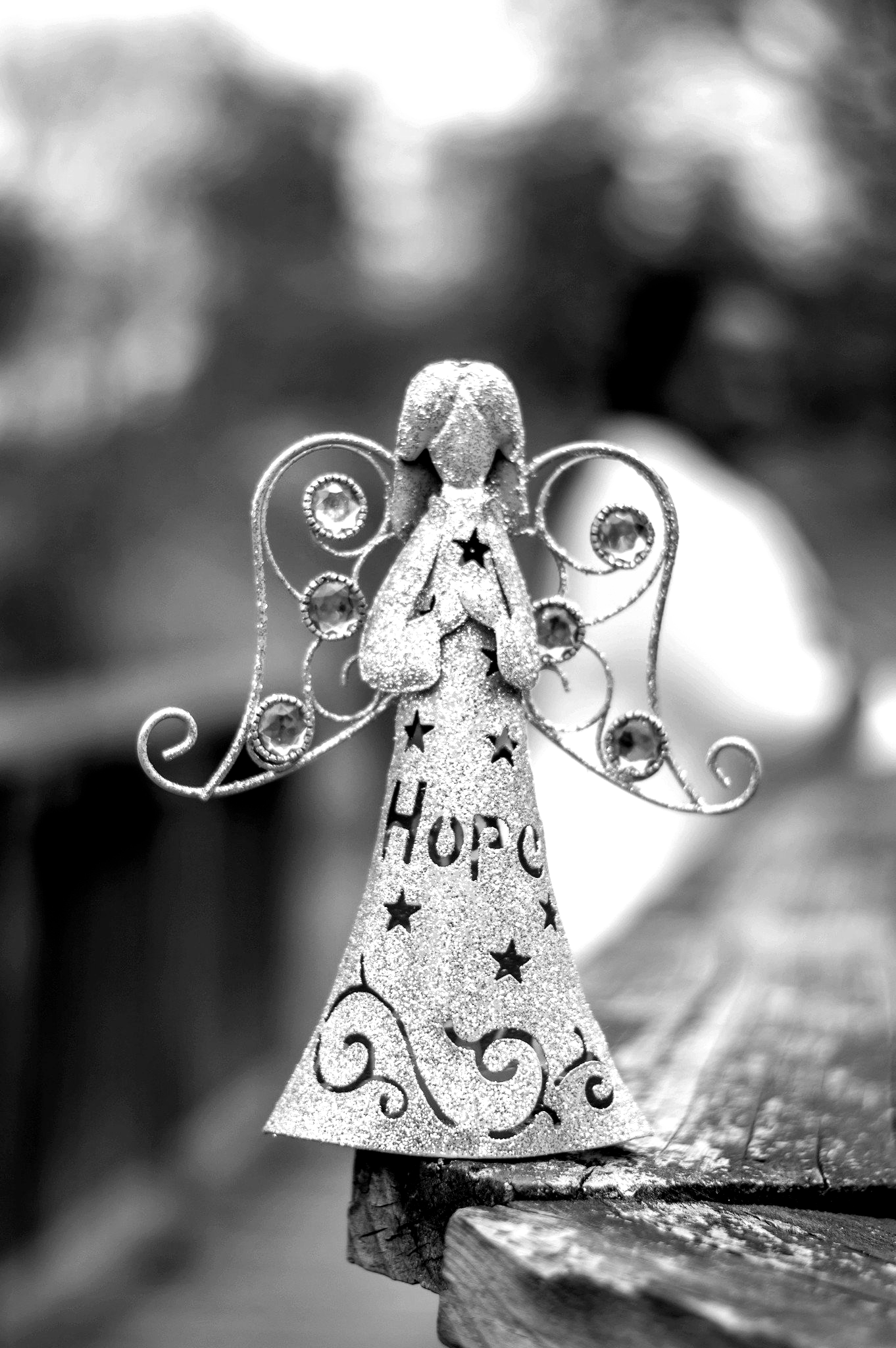 Angel ornament with hope engraved in the center