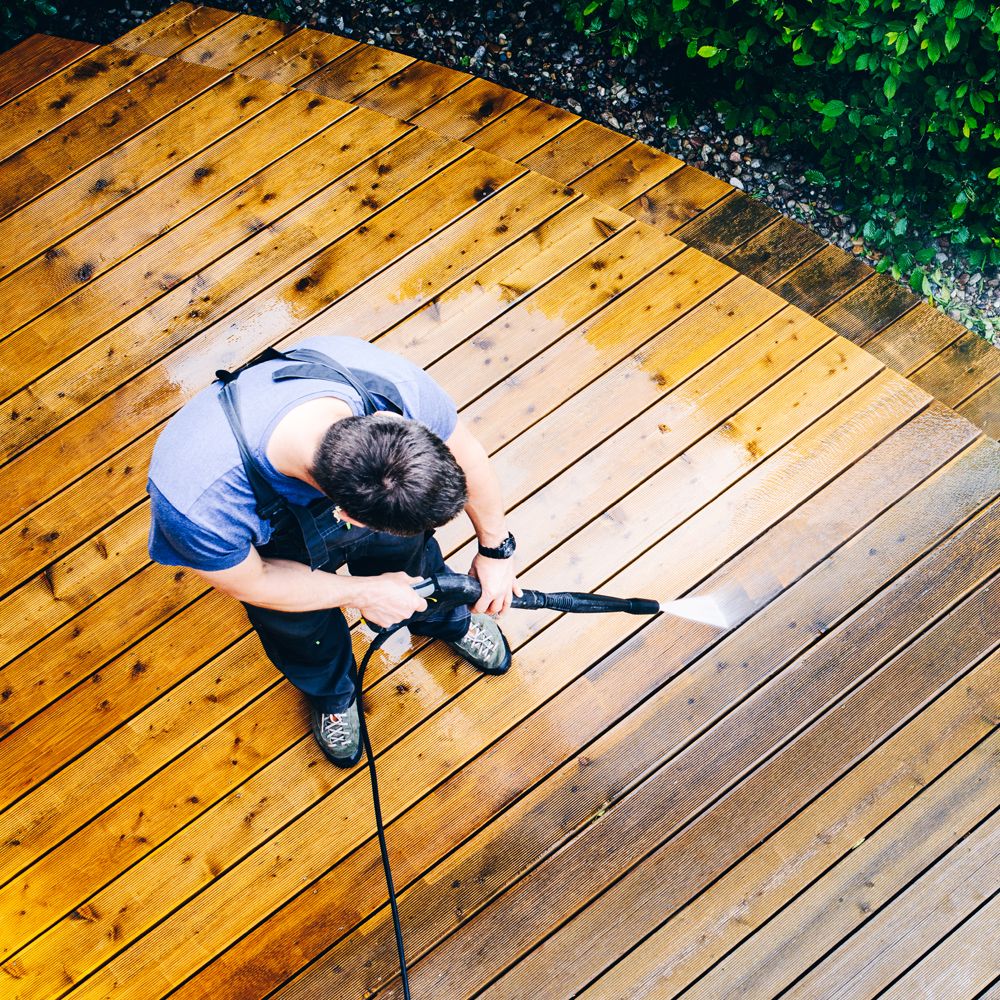 Professional Worker Cleaning a Dirty Deck