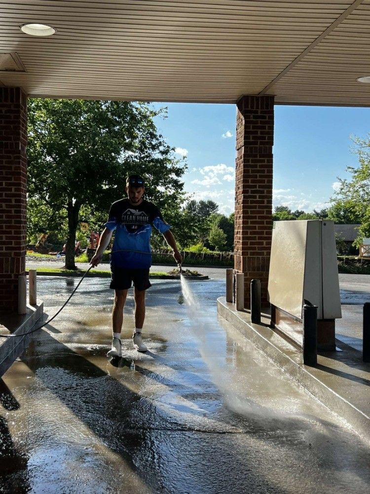 Professional Worker Doing Commercial Building Wall Cleaning