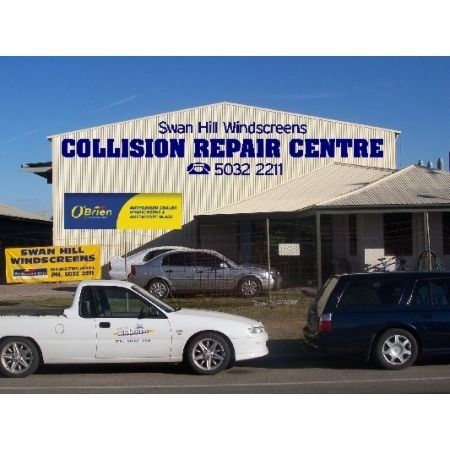 A white building with blue text 