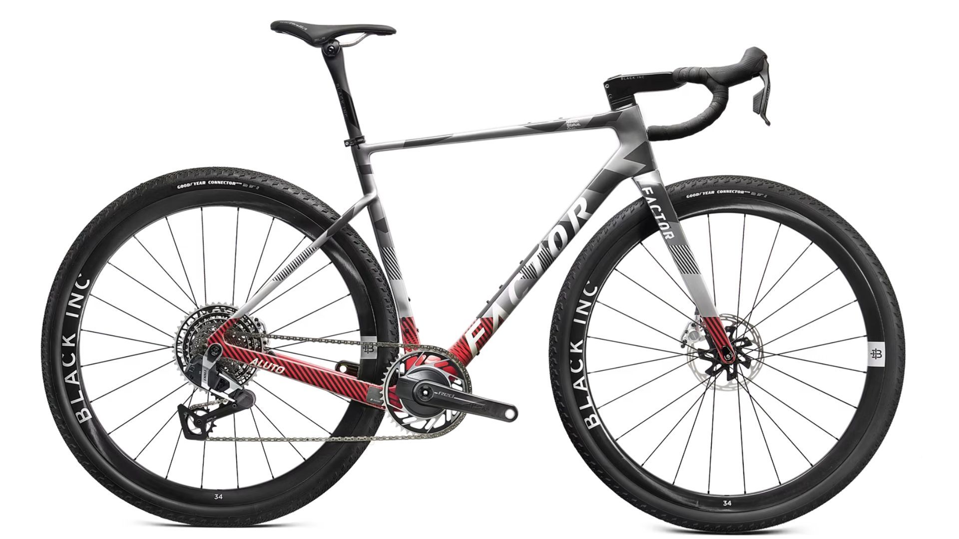 Gravel bike with black wheels, disc brakes, and grey, red, and black frame.