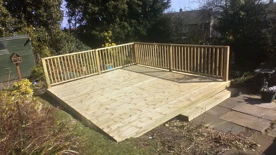 large square timber decking area installed in Sheffield