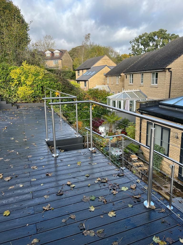 Decking Sheffield raised composite decking ideas with stainless steel and wire balustrade