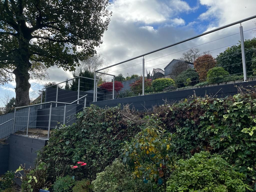 Decking Sheffield raised composite decking ideas with stainless steel and wire balustrade