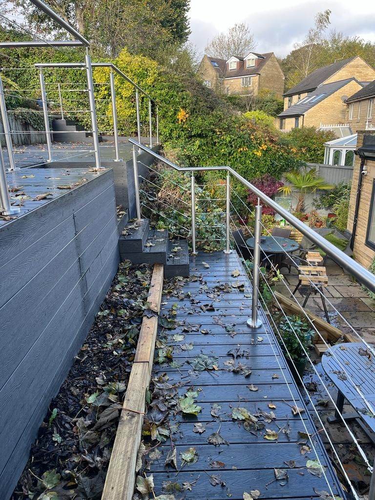 Decking Sheffield raised composite decking ideas with stainless steel and wire balustrade