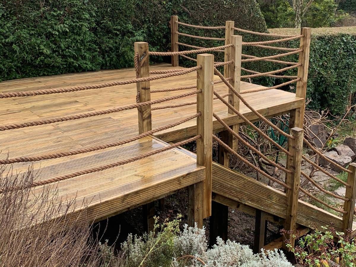 Rope swag balustrades fitted to raised timber decking in Sheffieldeffield