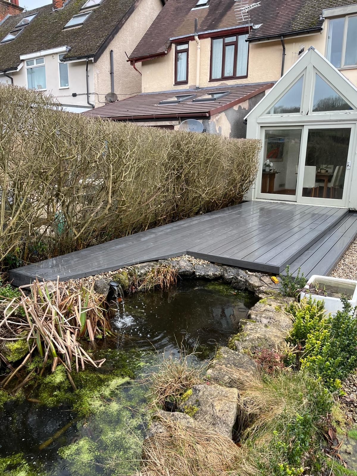 Decking Sheffield decking idea to surround a pond in small garden in Sheffield