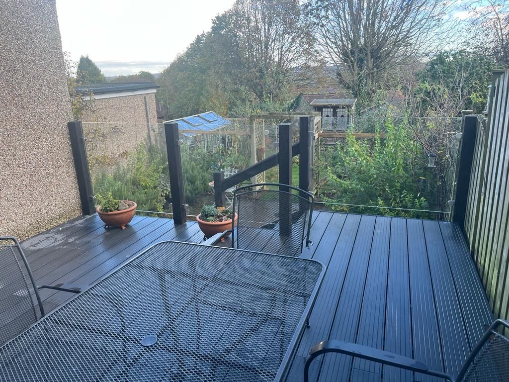 Decking Sheffield raised decking ideas with glass balustrade