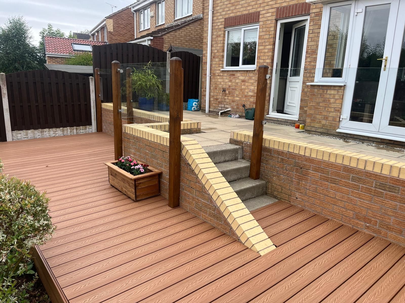 decking Sheffield teak composite decking with glass balustrade
