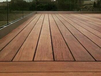 large hardwood decking area in garden of home in Sheffield