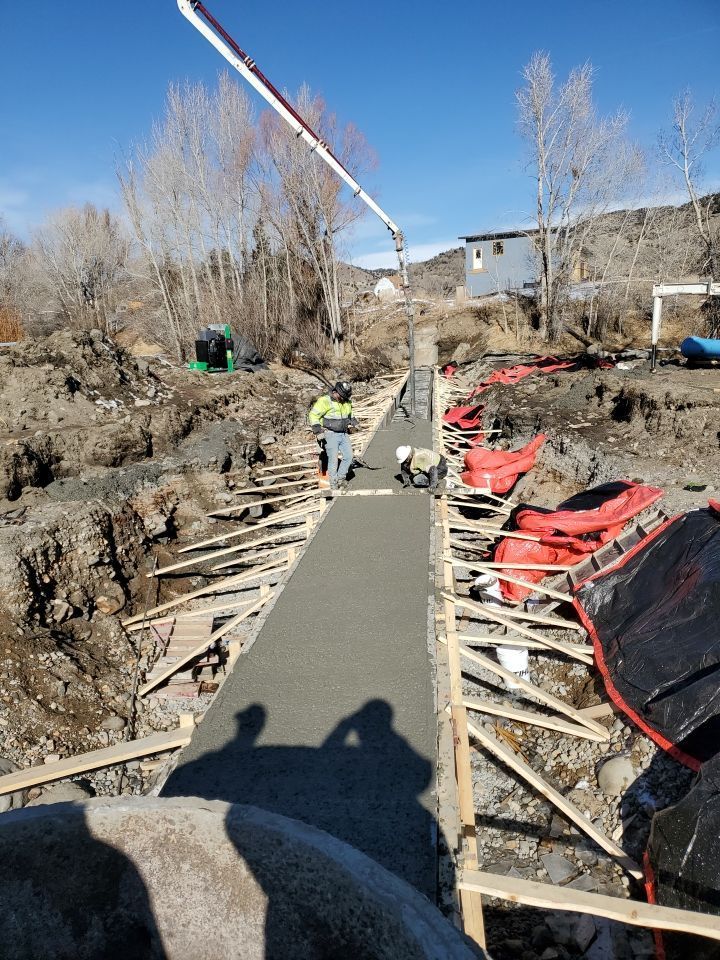 Concrete laid over pipe