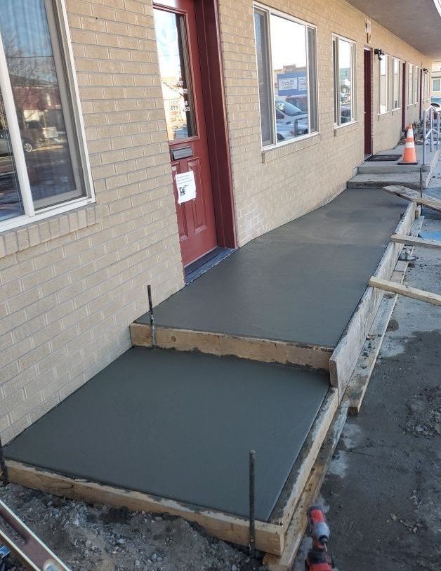 ADA access New concrete ramp & stairs