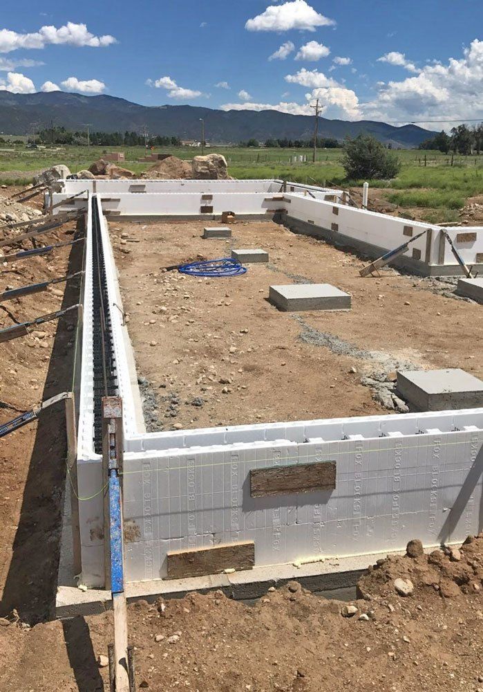 Thick foundation being laid.