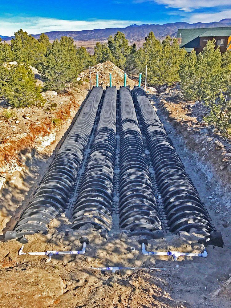 Septic Drain Field being Installed among landscape