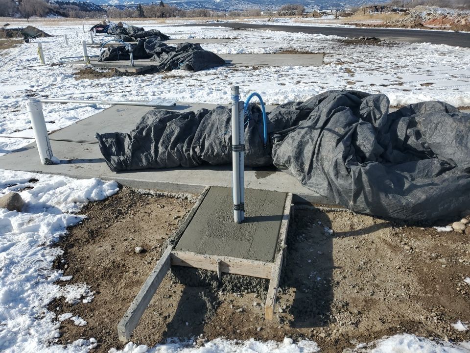 Foundations for RV park & water/power hookups built.