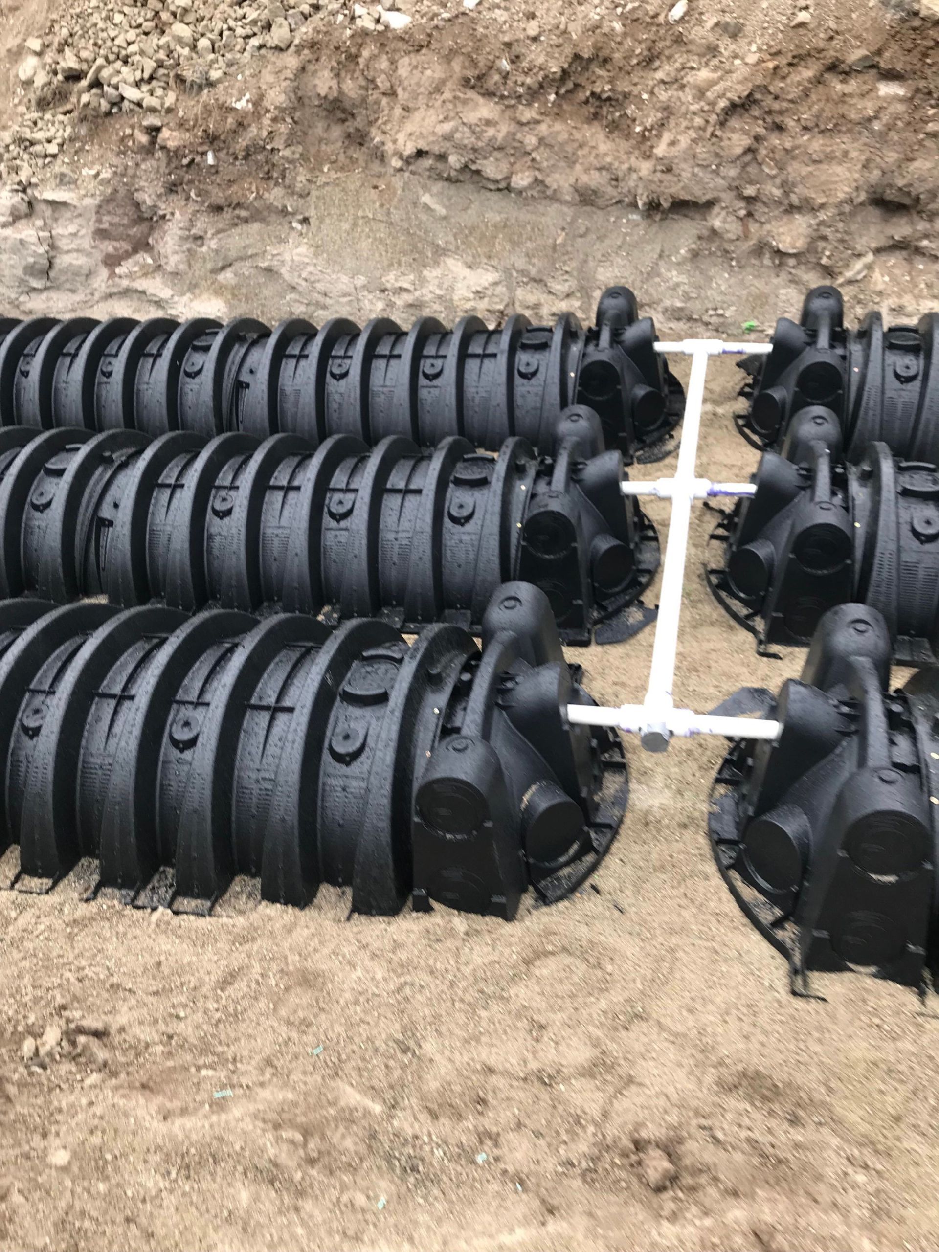 Septic drain field & pipe being laid.