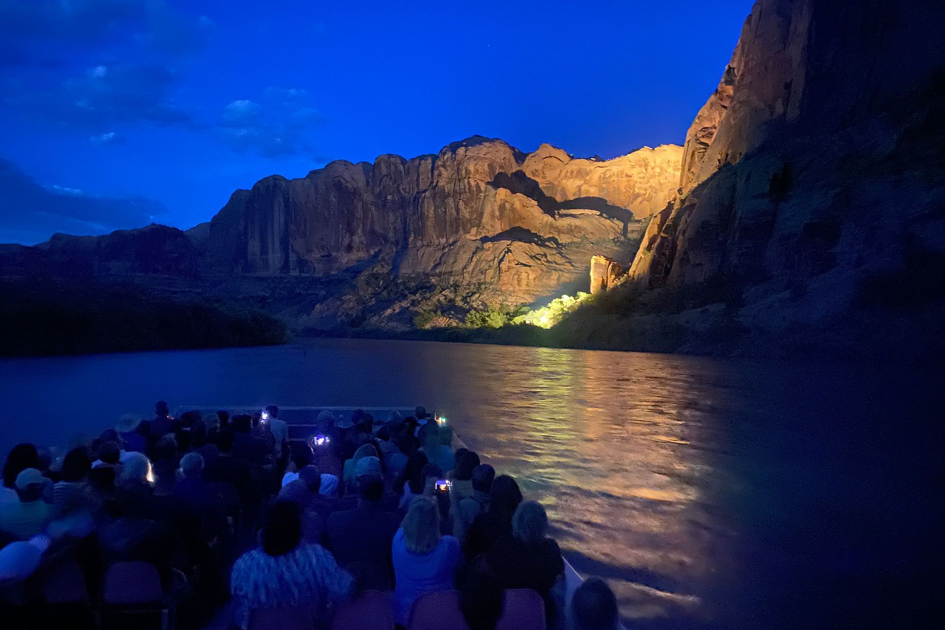 A Canyonlands by Night jetboat takes guests up the Colorado River where they watch lights illuminate the canyon walls.